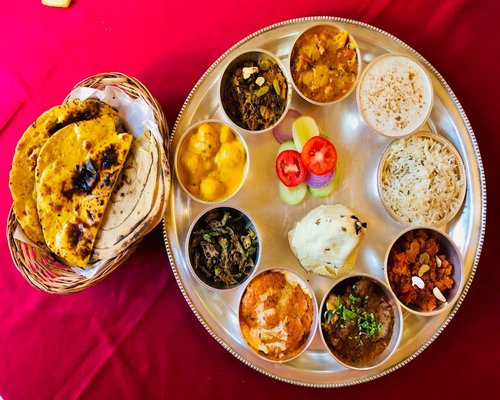 Traditional Indian home cooked meal with dal, roti, and fresh vegetables